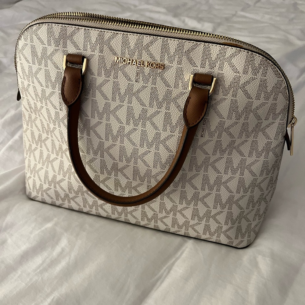 Very Gently used white and brown Micheal kors authentic bag